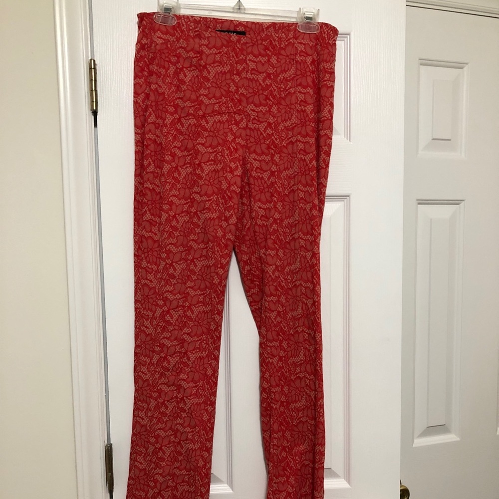 Coral, lace overlay trousers